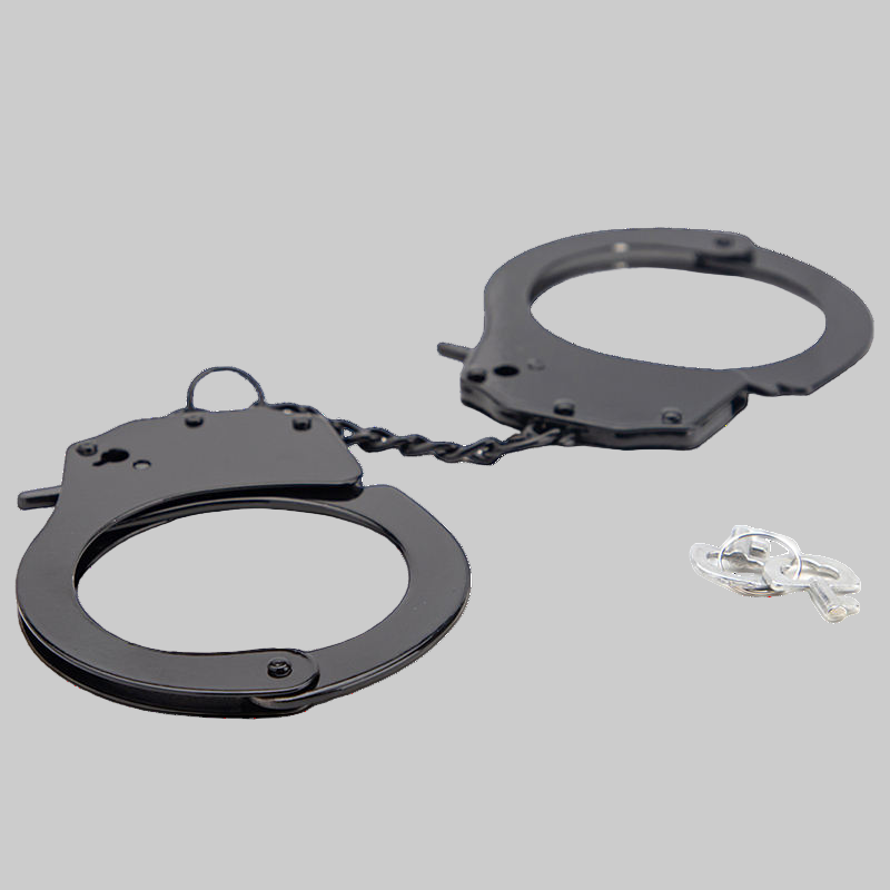 Black police handcuffs on a white background