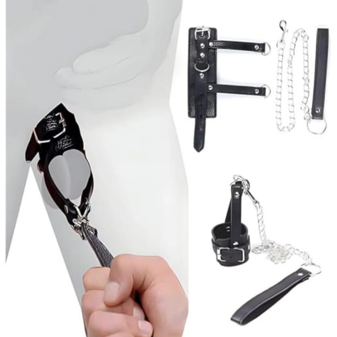 Collection of black leather restraints with chains on a white background